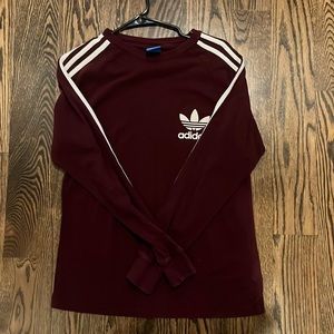 Dark red/ Maroon long sleeve adidas shirt.